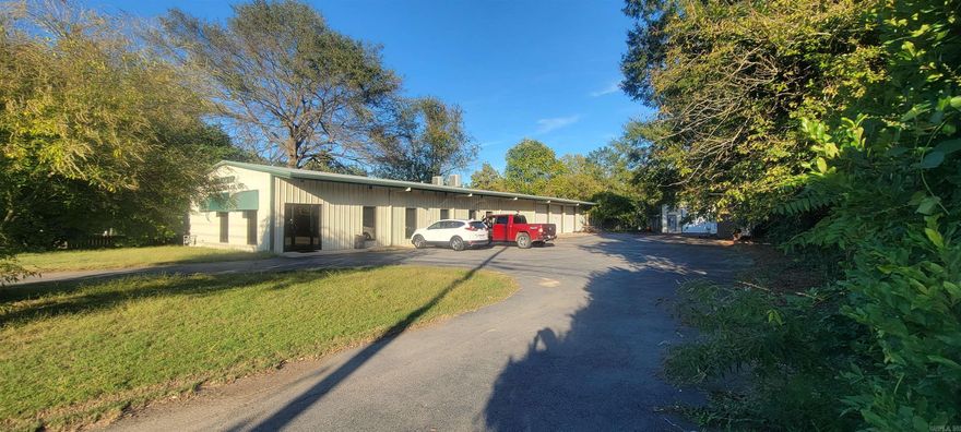 Perfect Space for your growing business!! 8 Office Spaces, 2 Bathrooms in the office space, break room, Utility Room - Heated and Cooled and attached is a Shop building with a 3rd bathroom - Shop is Heated. Second Metal Building with Electric (25x25). Great Location to move your Business too!!!! The building is handicap accessible!!!