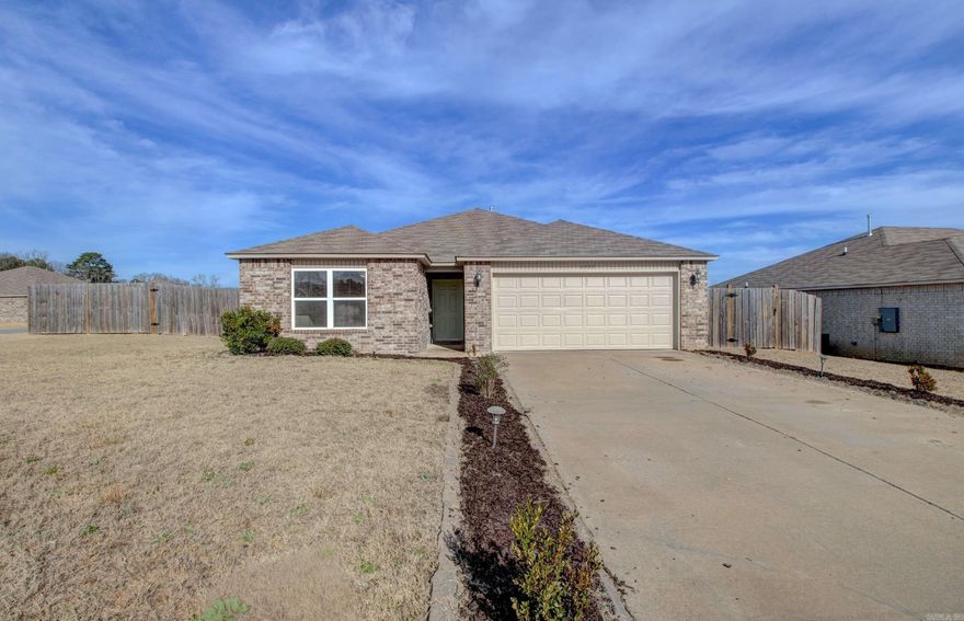 Welcome to this beautiful like-new 3-bed, 2-bath home in the desirable Meadows Edge subdivision! Situated on a corner lot and built in 2021, this open-concept floor plan features a welcoming foyer entry, a spacious living area that flows seamlessly into the kitchen, and comfortable living space throughout. The home offers modern finishes, abundant natural light, luxury vinyl flooring, stainless steal appliances, and a two-car attached garage. Enjoy relaxing evenings in your private backyard or take advantage of the community setting close to Bryant, Benton, and Little Rock. With low monthly HOA dues and quality construction, this property delivers a perfect blend of style, comfort, and convenience — a must-see home!