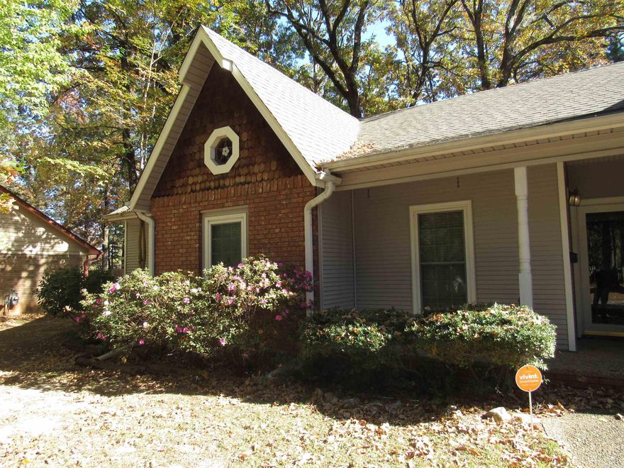 Close to everything in Maumelle, this home has plenty of storage, a great outbuilding with power and versatility, expansive wood flooring, a huge aggregate driveway and lots of trees for shade. Fencing offers plenty of access for lawnmowing or other yard tools. Quiet neighborhood setting with easy access to Little Rock or other I-40 commute.