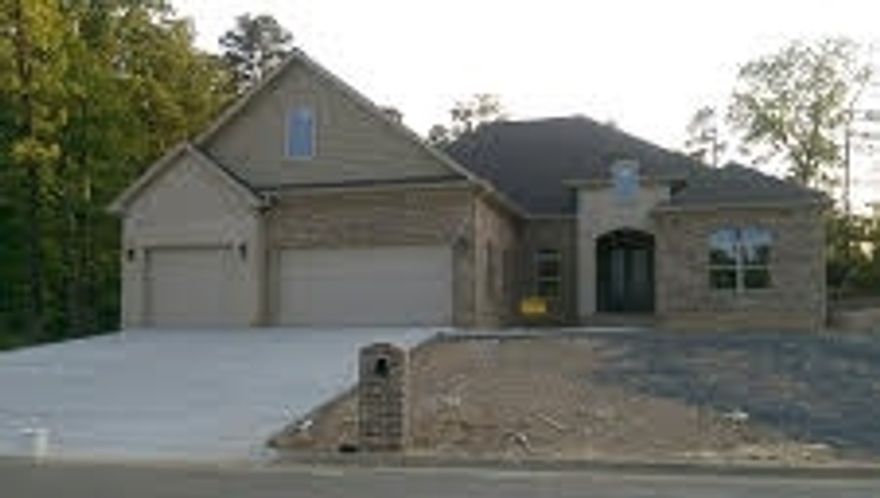Lavish new home in Chenal newest neighborhood! 10 & 11 foot  ceilings thru out home, all doors 8 foot solid core, open kitchen living room  concept with custom cabinets, double oven, gas cooktop, pull out microwave,10  foot island with seating for 5,granite counter tops thru out, double fire place  mantel, extensive trim package thru out the home. MBR. with 11 ft. tray  & bay window sitting area, Master bath has large soaking tub with a double  door tile shower with silver accents 1 rainhead,2 shower.