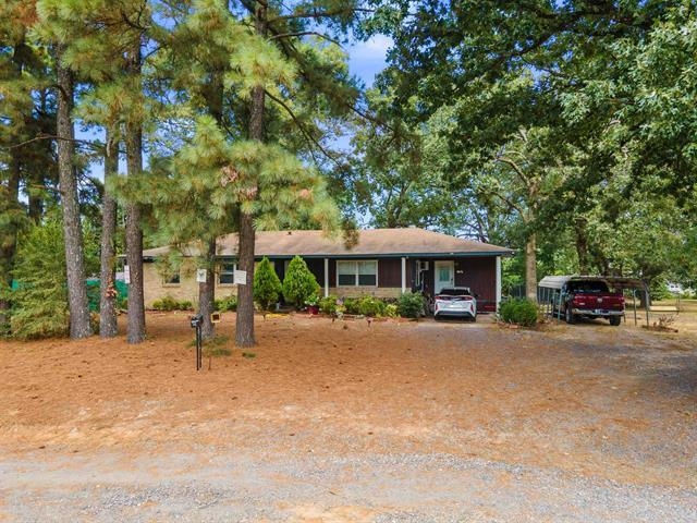 ACREAGE IN THE CITY!!?? Say no more, and look no further! LOCATION, LOCATION, LOCATION!! Just over 2.3 acres right off McCain and behind Home Depot! The land is flat, and very well maintained! The home features 3 bedrooms, 2 bathrooms, with a new, large deck off the back! This could be your personal home while you build your business next door, or could make an excellent office building - ENDLESS POSSIBILITIES! SCHEDULE A SHOWING TODAY!