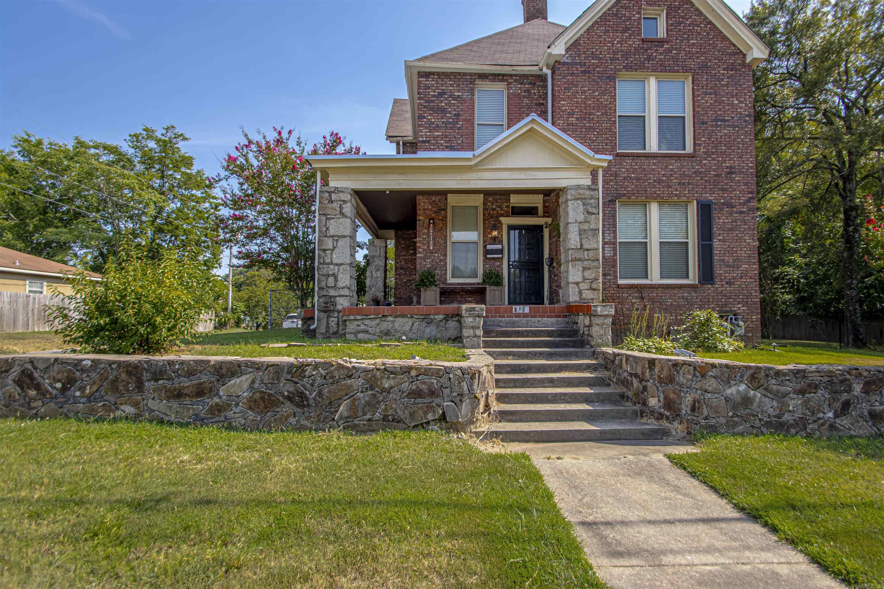 Beautifully updated 1920's built historic home has large bedrooms all upstairs with tons of storage. There is a large formal living room, large dining room, gigantic updated kitchen, walk in pantry and a large fenced in back and side yard. There is detached two car garage and a separate 1 bedroom apartment with the garage.