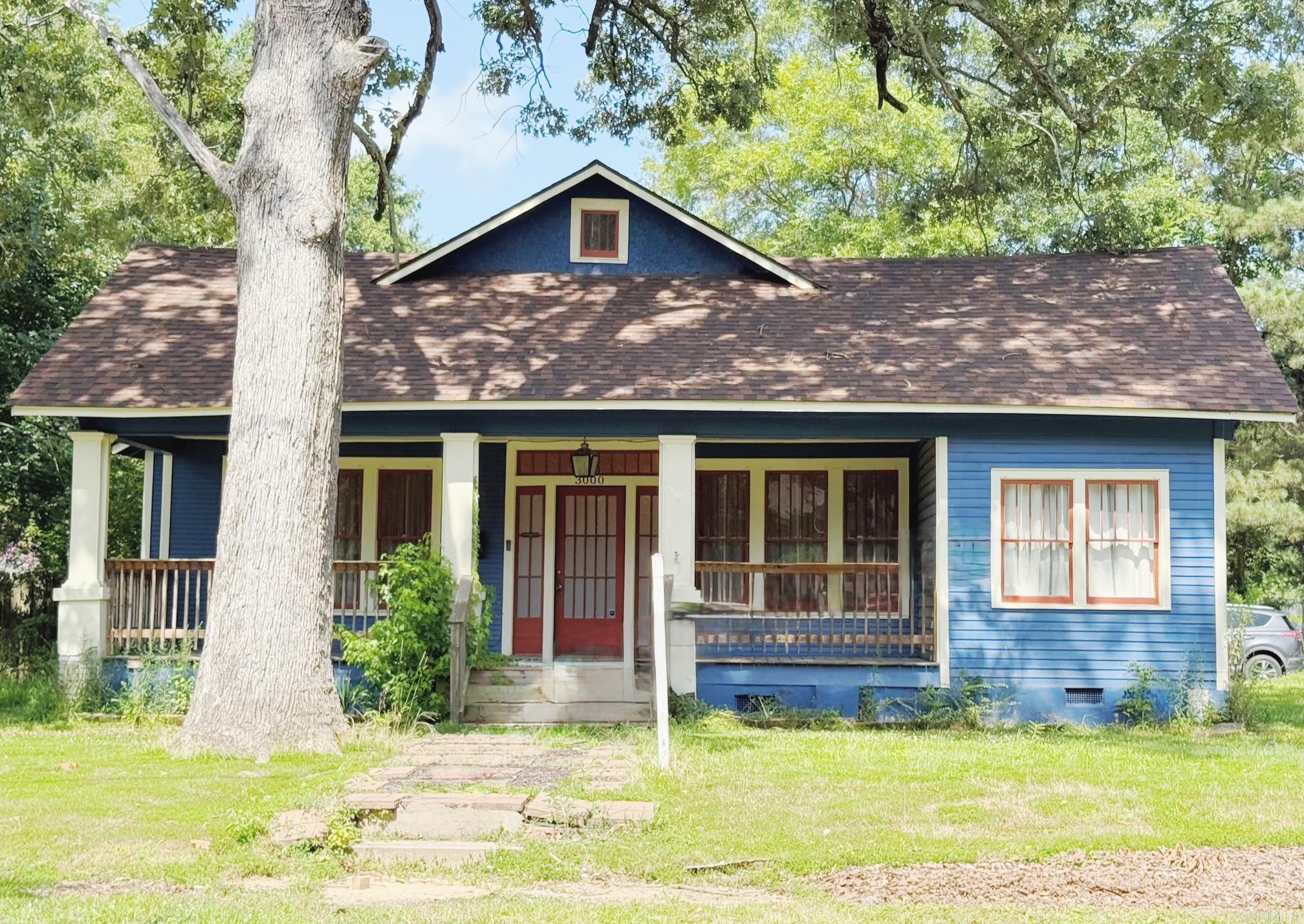 Charming Craftsman-style home located on a corner lot in Pine Bluff! This property features classic curb appeal with a spacious front porch, wood columns, and original character throughout. While some updates have been made in recent years, the home offers an excellent opportunity for buyers to add their own personal touches. Ideal for homeowners or investors seeking a solid property with strong potential. Conveniently located near schools, parks, and local amenities.