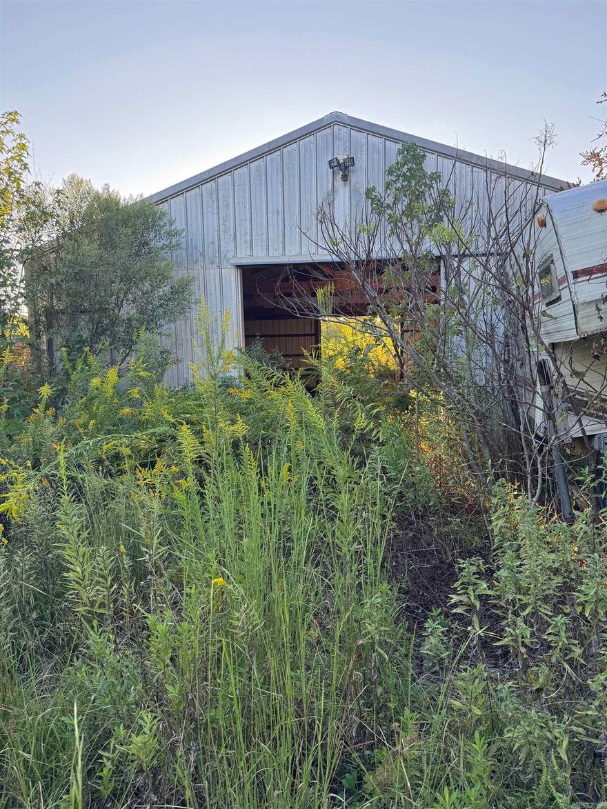 Perfect land to create your new hobby farm with a 30 x 40 metal barn already in place. The barn is wired for electricity, just needs a new service installed. Located near the end of a dead end road. Property is fenced and also includes a very nice spring-fed pond. Septic and water are already installed. New pictures will be uploaded soon. AGENTS PLEASE SEE PRIVATE REMARKS.
