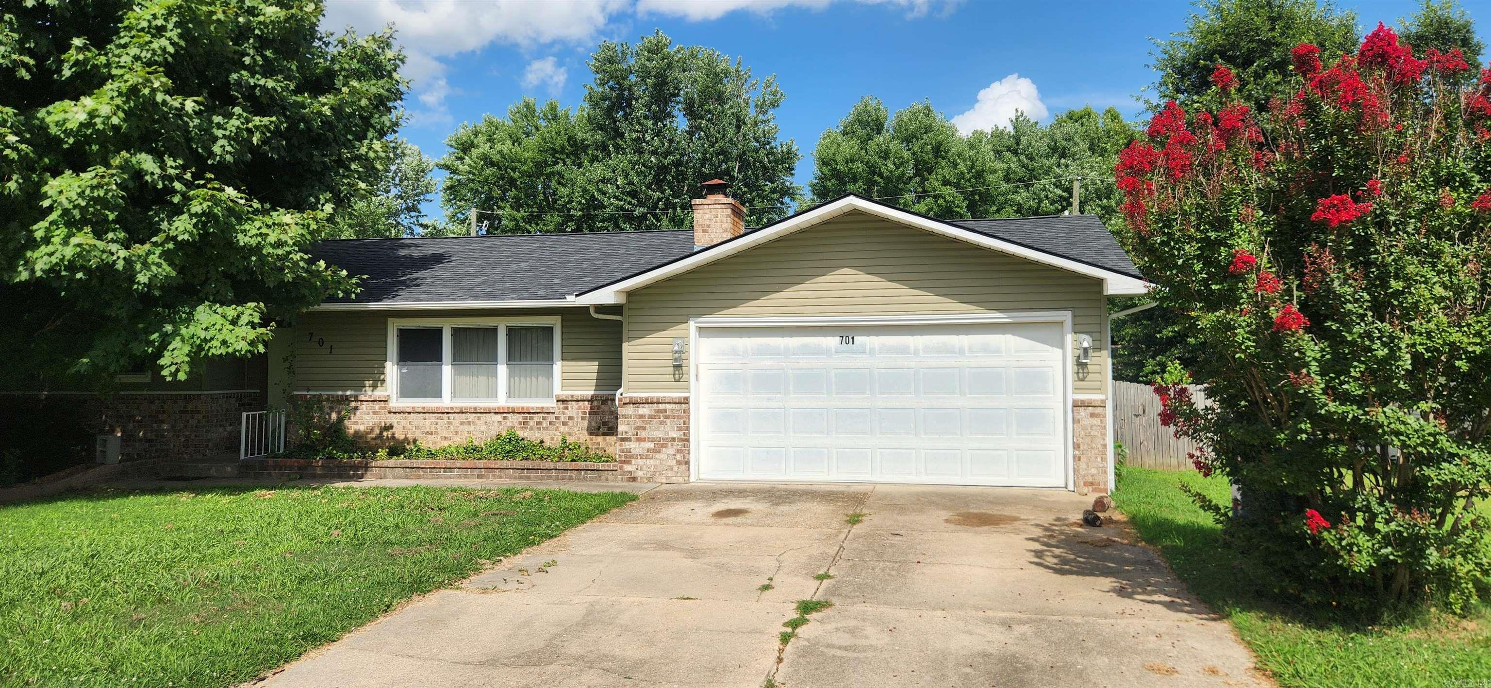 3-bedroom, 3-bath home with 1,923 sq. ft. in a convenient in-town location. Features include a wide galley kitchen with a new dishwasher, a fully fenced backyard with deck and storage shed, and a brand-new roof installed in 2024. Great layout with plenty of space for a busy household.