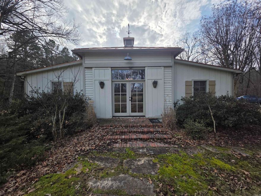 If you are looking for a beautifully unique home in a country setting, this is the one! It features a custom built main house of 1520 Sq Ft having beautiful tongue and groove wood throughout with large overhead beams in the open concept living/kitchen area.  Both bedrooms have a large adjoining bathroom. One having a spacious walk in shower with multiple shower heads and the other having a beautiful claw foot tub.  It sits on 10 mostly cleared acres with lots of wildlife around. The 21x24 heated and cooled bonus room located off the back deck is perfect for hanging out or entertaining by the fireplace.  Come on home! You know you want it!