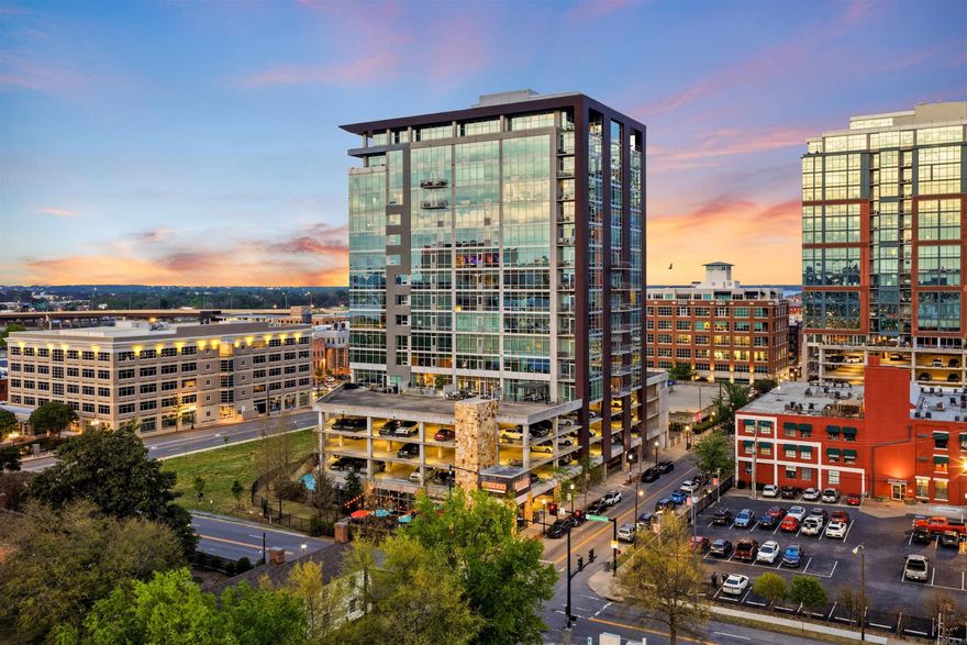 Welcome to this professionally designed 2-bedroom residence offering a blend of sophistication, skyline views, & easy downtown living. Floor-to-ceiling windows bring in incredible natural light and showcase the Little Rock skyline. One of the standout features of this home is the oversized private balcony, a rare offering in the building. It’s fully equipped with a built-in grill, firepit, integrated lighting, and automated irrigation, making it the perfect place for sunsets, cookouts, or simply unwinding above the city. Inside, the open layout feels refined and inviting. One of the bedrooms has been converted into a stylish office/study with double glass doors and can easily function as a guest room when needed. Residents of 300 Third enjoy concierge services, fitness center, swimming pool, a party room, and secure parking. This unit includes two designated parking spaces in the private deck. With the River Market, dining, shopping, and cultural spots just steps away, the lifestyle here is walkable, connected, and convenient. Optional on-site storage is available. Opportunities like this are uncommon, experience the best of downtown living in a residence that truly rises above.