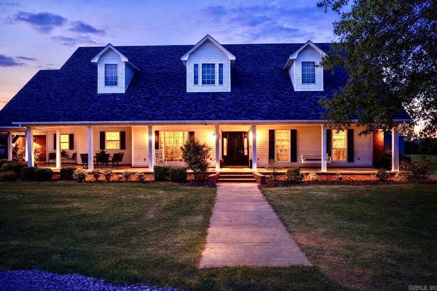 Within Greenbrier, AR city limits and minutes from shopping and top rated Greenbrier schools, a rare opportunity to own 20 unrivaled private acres, a luxurious estate with pool and pool house all in a great location awaits your visit. This private estate delivers a peaceful country setting without sacrificing accessibility. This custom luxury home features a home office, formal dining room, two spacious living areas, and a gourmet kitchen with an island and separate scullery prep kitchen designed for effortless entertaining. A versatile flex room above the garage provides a 4th bedroom or bonus space. Rich hardwood floors, custom built-ins, and extensive trim work highlight the quality craftsmanship. The split floor plan offers a private primary suite with a custom closet, direct laundry access, and secure saferoom. Expansive covered porches overlook beautiful acreage. The backyard retreat includes a resort-style pool and a fully equipped shop with bath, kitchenette, and fireplace—ideal for guests, hobbies, or year-round entertaining. Fresh paint and thoughtful updates make this move-in-ready luxury acreage property in Faulkner County truly one of a kind. Just imagine—don’t miss it