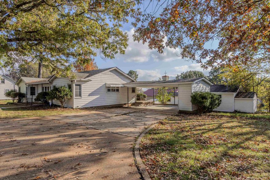 Welcome to the market, 305 W Black Street in Pocahontas, AR! This charming home is located in the heart of town close to the town park, aquatic center, minutes from downtown, and the infamous Black River! Nestled into its large parcel by mature shade trees and hosting all of the unique features and characteristics of southern charm just waiting on its new owner's custom touch! This home boasts three generously sized bedrooms, a full primary suite, two full bathrooms, and one half bathroom conveniently located off the den and kitchen areas. Entering through the front door, you will find custom craftsmanship throughout, beautiful cabinetry with ample storage in the kitchen and dining areas, custom built-in features in the den, and a large fireplace for cozy winter nights in the living room! Exterior features rival interior amenities for this unique property featuring a shop with electric and furnace, multiple exterior storage units both attached from carport and separate storage rooms within detached shop. Working from home - business, pleasure, or hobbies - just got a whole lot easier thanks to all the opportunities of this property! Call your favorite agent today to make it yours!