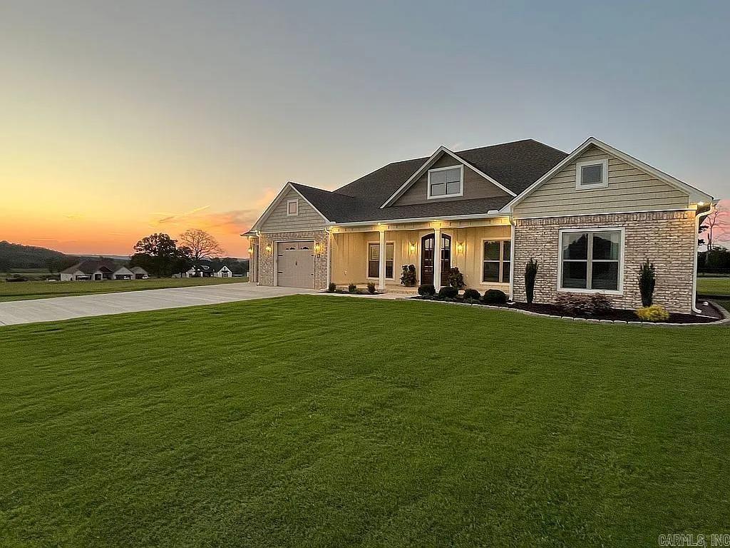 Stunning 2024 Custom Home in the Heart of Republican Valley Estates Nestled on a serene, well-maintained .98-acre lot, this move-in-ready home boasts 2,450 square feet of expertly designed living space. With 4 bedrooms and 2.5 bathrooms, this custom-built gem is designed for both comfort and style. As you enter, you'll be greeted by an open-concept floor plan that flows seamlessly between the spacious Living Room, Dining Room, and a stunning kitchen. The kitchen is a true centerpiece, featuring a large island, ample cabinetry for storage, and a walk-in pantry with a charming custom barn door. All new, high-end appliances are included. The Living Room offers a cozy electric fireplace and plenty of space to relax while enjoying the view of your private, fully fenced backyard. On the side, three well-sized bedrooms share a full bathroom, complete with a linen closet. Your Master Suite is a luxurious retreat, featuring an expansive layout and a Master Bath designed with relaxation in mind. Separate vanities, a large soaker tub, and a double-entry shower offer ultimate comfort. Adjacent to the bath, two generous walk-in closets provide plenty of storage.