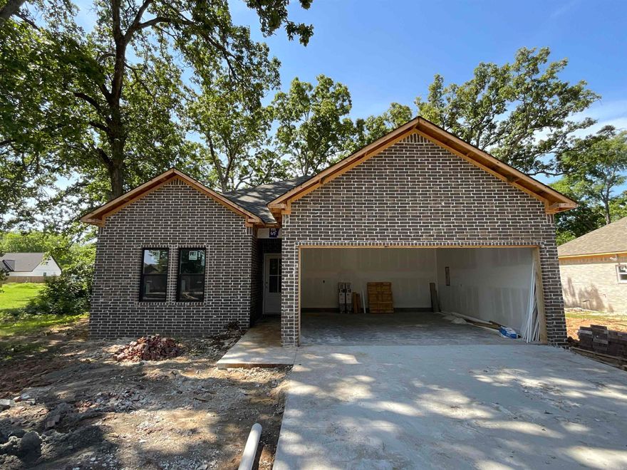 Lonoke is getting some wonderful new additions to this beautiful neighborhood! Super convenient access to I-40 makes this a tucked-away gem! All-brick exterior opens to an open concept living space! You will find all these rooms "just right" in size, including the high ceilings in living room and primary bedroom! Drywall is going up this week, so more pictures and floorplan map will be coming soon!