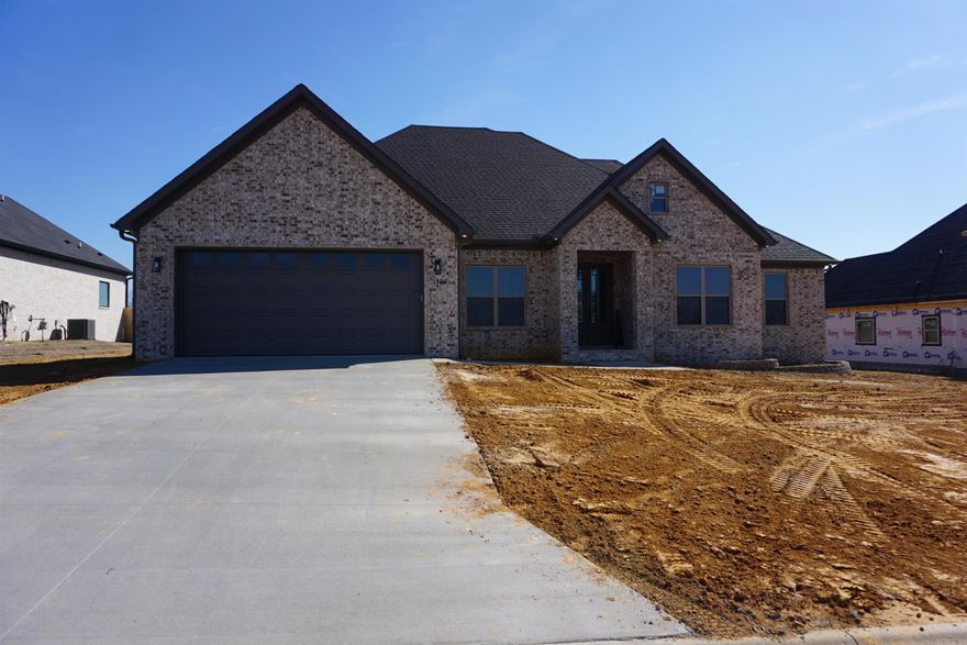 Beautiful home with custom stained cabinets, granite countertops, large island pot filler and nice appliance package. Very open floor plan with a large walk in pantry and separate office off the foyer. Wonderful soaker tub separate tile shower plus separated vanities and a huge walk in closet with built ins. Laundry room is off the primary suite and also off the mud room coming in from the garage.  Large covered back porch with an additional patio below the back porch which features tv connections and natural gas hookup. This is a very nice new construction home in a beautiful subdivision in Searcy