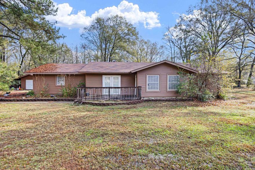 Beautifully updated and move-in ready on 1.76 acres in Atkins! This 3-bedroom home has been thoughtfully remodeled with major improvements already taken care of. A new roof and hot water heater were added in 2018, followed by a full renovation in 2020 featuring updated electrical, extra insulation, new HVAC, and all new appliances. The kitchen offers granite countertops, new oak cabinets with pullouts, and under-cabinet lighting. Enjoy the built-in wet bar—great for entertaining or extra prep space. Septic was pumped in 2020. An office/flex room off the carport includes central heat and air, perfect for working from home, hobbies, or additional storage. This well-maintained property offers comfort, efficiency, and space both inside and out. Don’t miss it!