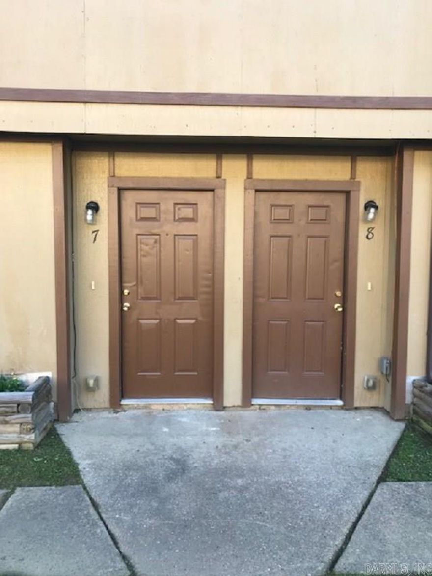 Come take a look at this large three bedroom townhouse with updated tile flooring and stylish upgrades! Easy access to I-430 & I-630. Kitchen comes equipped with stove, dishwasher, and refrigerator. All electric unit means tenant only pays electricity and water. Sorry, no pets and no smoking. Housing may be accepted.