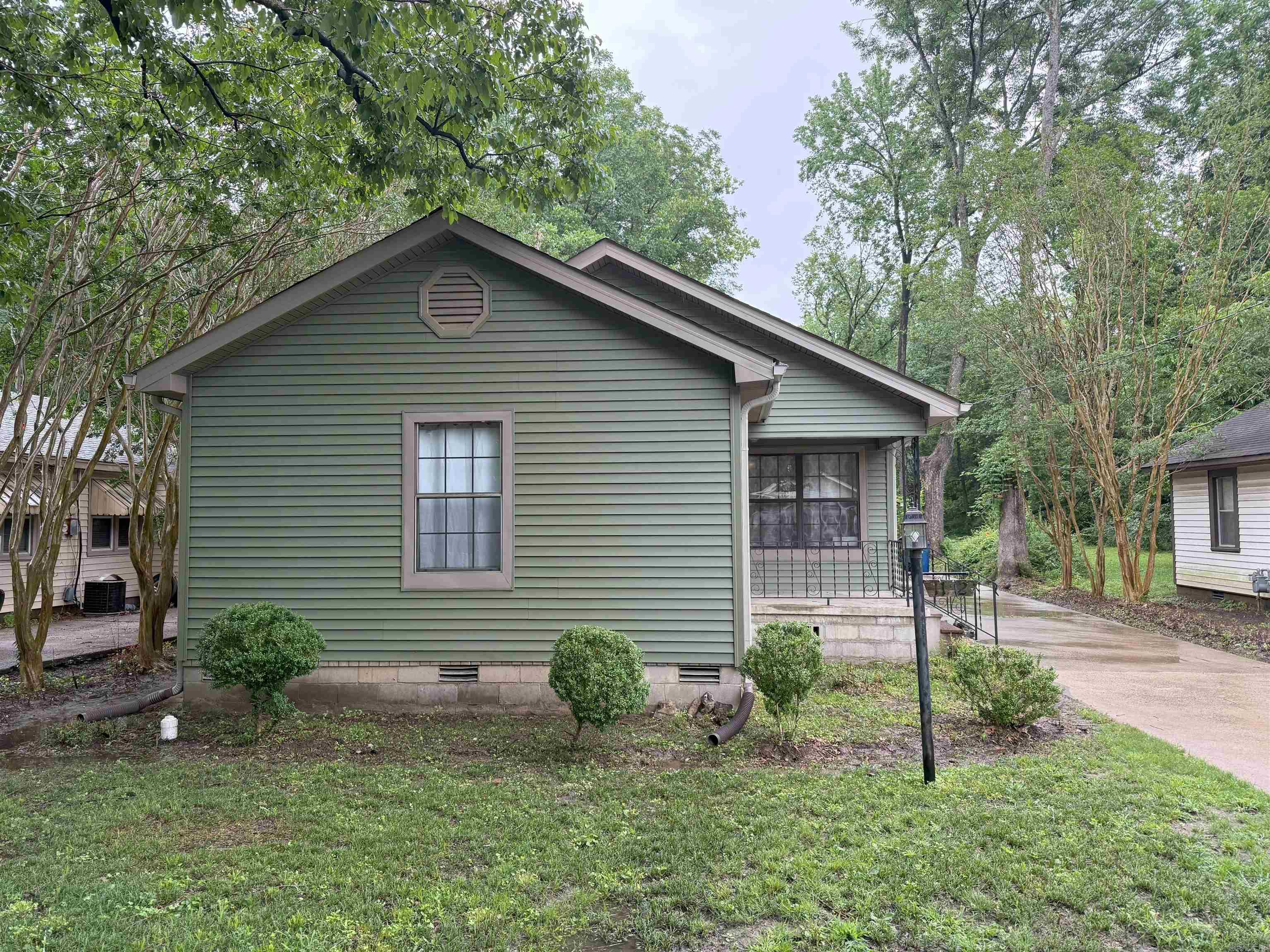 New siding, roof, and gutters on a large well manicured yard. House features 3 bed/2 bath with screened in porch and two car garage. Fresh paint in bedrooms!