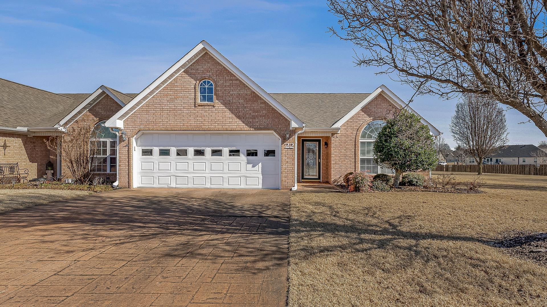 Are you looking for a wonderful opportunity of condo living, welcome to this all brick 2 bedrooms, two large baths, vaulted dining/family room with gas log fireplace and built-ins including a cozy bay window. Secure and serene living in the Enclave Subdivision! Some upgrades are a tiled walk in shower in the primary bath, new flooring in the sunroom, and the hall bath opens to the vaulted guest room as well as the hall. Enjoy a stocked pond with a lighted fountain, a charming gazebo, and well-lit streets. Plus, convenient guest parking areas make this community a standout!
