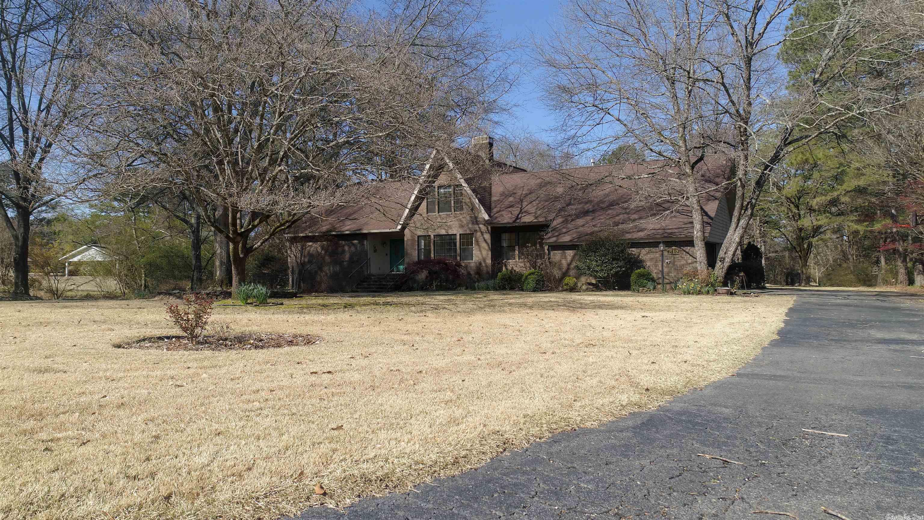 Nestled in the back of a cul-de-sac in the heart of Heber Springs lies this 1.26 acre Lakefront home which is directly North of Sandy Beach.  Take an easy stroll thru the garden like atmosphere to the shoreline of Greers Ferry Lake. This house boasts 4 bedrooms, 3 1/2 baths, bonus room, formal dining and living room, den with fireplace and lots of natural light thru out home. Perfect for a large family or a second home retreat!!! See agent remarks