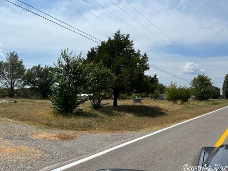 Quiet 1 acre lot backing up to a hay field. Lined with crepe myrtles and maple trees, this 1 acre lot will make a beautiful home site. Well, septic and electric on-site. 10 minutes to Bald Knob and 5 minutes to Pleasant Plains.