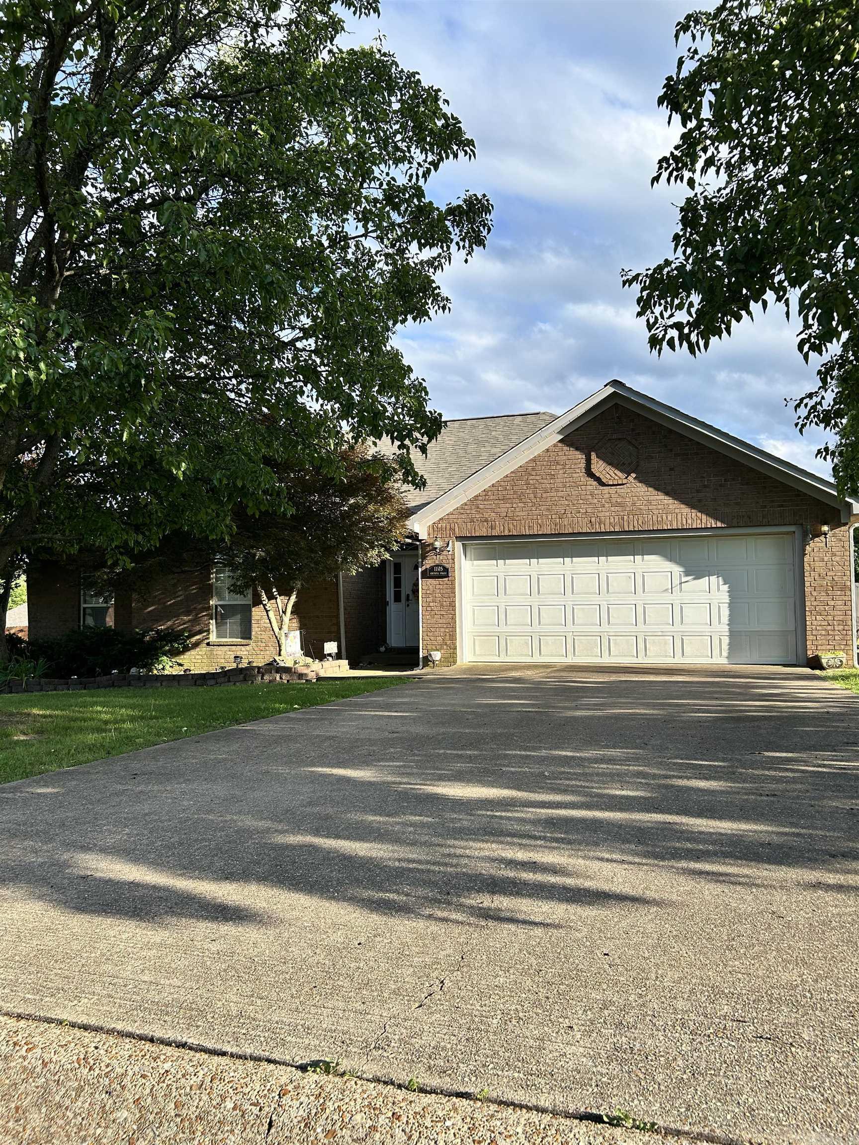 BACK ON THE MARKET !! Lovely four-bedroom two bath brick home tucked away, close to everything, in the Ivanton Addition. As you enter the drive, you will be charmed by the landscaping, including a peach tree in the front, a pear tree in the back, and a beautiful Japanese Maple at the front doorānice large lot with a single gate on one side and a double gate on the other. Hardwood flooring in the living area. A separate laundry room with a sink and storage space. The primary bedroom has new laminate flooring and a walk-in closet. The primary bathroom features a jetted tub and a walk-in shower. One of the bedrooms is currently being used as an office, featuring a handcrafted large corner desk that will convey.