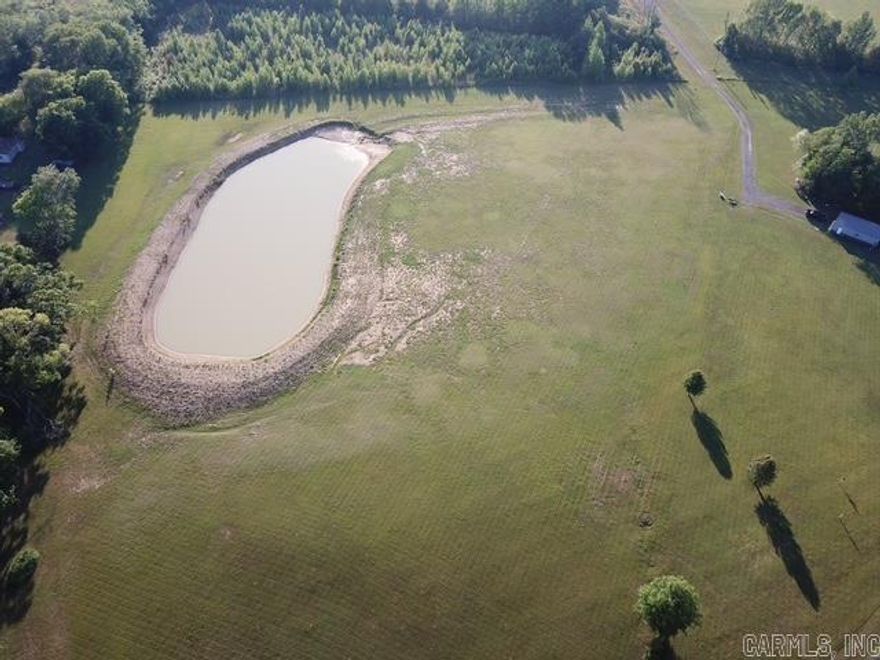 Excellent location to build your dream home. Very private level land located at the end of the road. Utilities are available at the entrance of the property. Enjoy your very own pond for fishing or a picnic area. Plenty of level land for several building sites for you to choose from. The far east side of the property has approximately 2 acres of timber. Call for a showing.