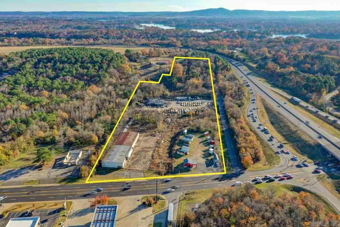 Ripe and Ready for development. Huge commercial potential!!! Approximately 13.13 acres with frontage on Airport Road and John Owens Road. Freeway exit location. Excellent access and great visibility. Cross traffic count of 78,000 cars a day. Zoned C-4 and R-2. Value is in the land.