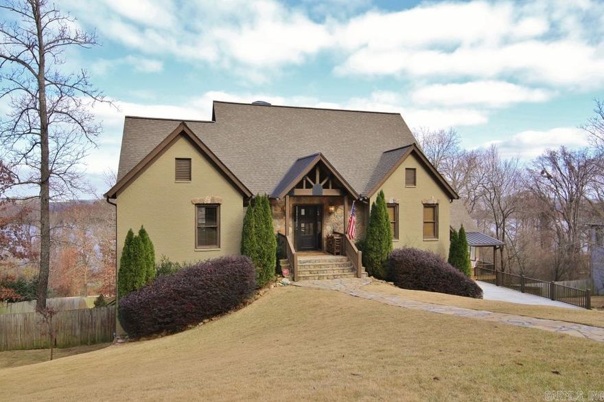 Architect Designed custom built tome with In-Law Quarters (2700sf) w/separate entrance.  High vaulted ceilings, game room, exercise room, play room, office, 2 car garage and extra 1 car garage.  Swimming pool with extensive decking.  Gated neighborhood.  2 Kitchens. View of Arkansas River and Pinnacle Mtn. with easy access to river bike trail and Big Dam Bridge.  Extensive decking for entertaining and enjoying the views.  See Agent Remarks for exclusions.