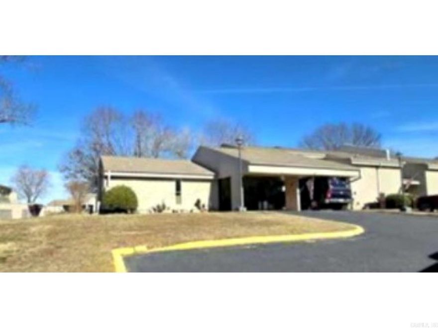 Rare ground-level 2 bed, 2 bath condo with carport and extra storage in the desirable Lakewood Hills community of Fairfield Bay. This beautifully updated home features upgrades throughout, including a fully serviced HVAC system, updated plumbing and electrical, cozy fireplace, and luxury vinyl flooring. The open living area offers abundant natural light, widened doorways, smooth ceilings, attic storage, and easy accessibility with a step-in shower and relaxing soaker tub. Enjoy low-maintenance living plus access to all the incredible Fairfield Bay amenities—golf, lake, trails, marina, dining, and more. Lakewood Hills residents also enjoy a private owners-only community pool. Move-in ready and hard to find at this level. Call to schedule your tour today.