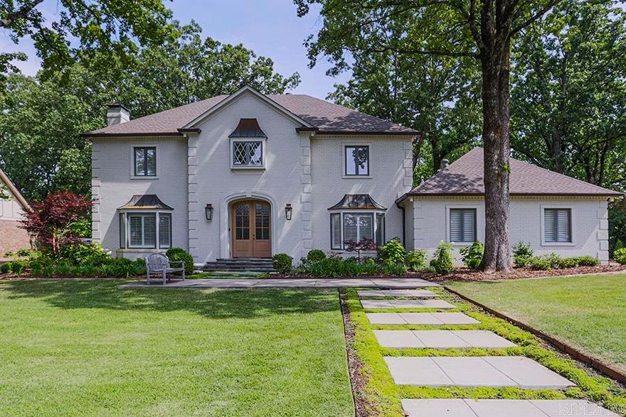 This stunning home showcases an incredible remodel worthy of Architectural Digest! Exquisite finishes throughout the interior include new doors, new flooring, new hardware, new honed marble & quartz countertops, new kitchen sink with Brizo faucet, new Wolf appliances (gas cooktop, double oven, microwave), new Fisher Paykel dishwasher drawers, new Subzero fridge, all new bar/butler's pantry, new laundry room, and even new Aria vents.  The luxurious bathrooms all boast updates that include a "floating" quartz vanity, Brizo fixtures, freestanding Brizo tub, new lighting, and more! Outside updates include new gas lanterns, new front walk, new Bluestone steps & landing, new landscaping, new sprinkler system to name a few. This home exudes quality and elegance blended with supreme comfort, and its handsome traditional style would be a home in any city in the country.  It truly is a masterpiece!