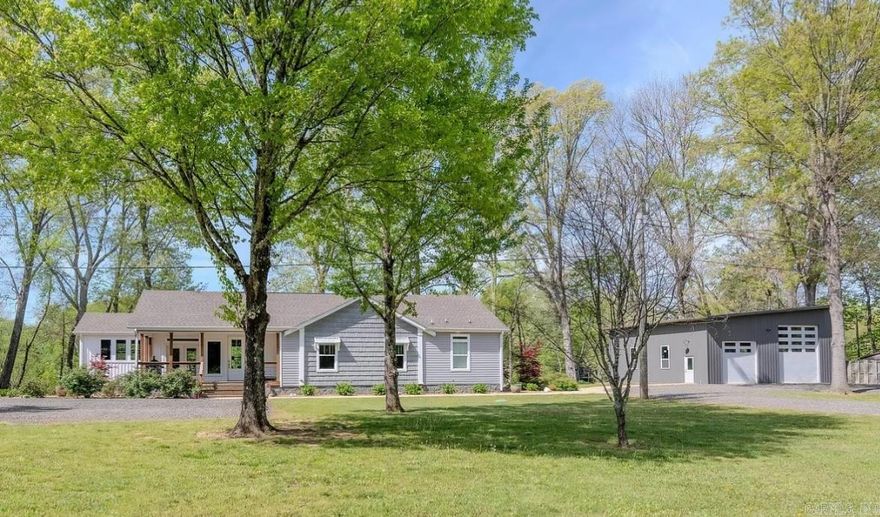 NOTHING like it on the Little Red River. Beautiful, fully furnished home on three full-sized riverfront lots. Around 300 feet of riverfront on some of the most productive trout waters in North America. ADDITIONALLY, 8.04 timbered acres immediately across Riverbend Road are included with this listing--adds privacy, additional building sites or a private hunting preserve to this listing! Custom home is extremely well constructed with all the comforts. 2x6 walls, Bosch Premium Inverter HVAC, 18 Seer with dehumidifier and more. Outside you’ll enjoy covered decks, porches and mature landscaping. And there is still more than enough room to add additional homes or outbuildings if desired. The newer XL dock with lift for 20+ foot trout boat is covered and perfect for entertaining on the water. Plenty of room for your kayaks and paddle boards. 36x36' (1296 sf) shop with one 12x12 door and one 12x14 door, LED lighting, 50 amp wiring for RV, independent septic with dedicated driveway.  Minutes from Marinas and boat launch on spectacular Greers Ferry Lake, shopping and services in Heber Springs.     AGENTS SEE REMARKS! Two properties also listed separately MLS 25014798 land, 25014567 house.