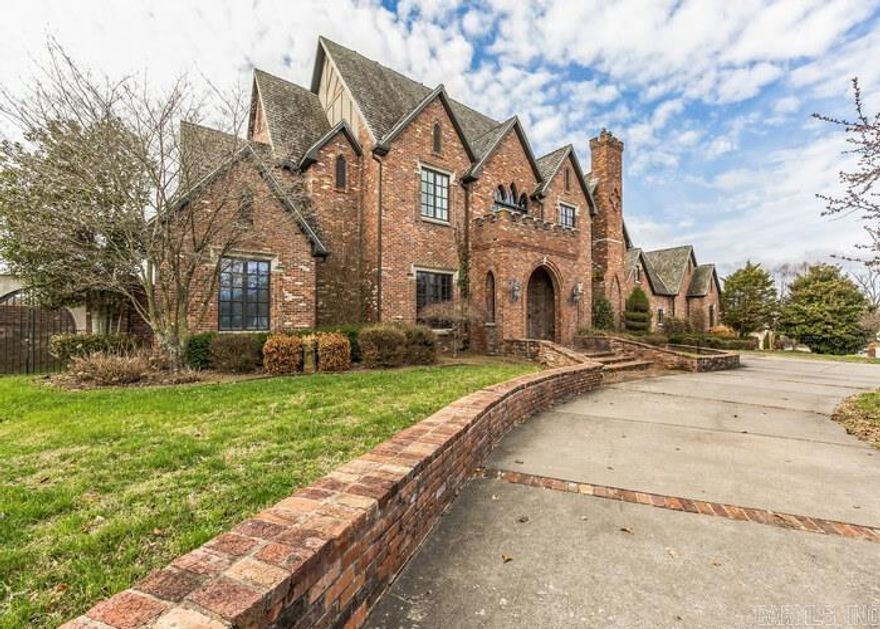 Here is an impressive example of good design reflecting European architecture with the charm of generations past. Gothic, grand details with handcrafted woodwork throughout. Soaring ceilings with massive beams. 5 bedrooms, 5 bathrooms with 2 half bathrooms. Over 7000 sf. Home likely needs new roof, paint, flooring and other repairs. Don't miss seeing this one. REO RESERVE AUCTION PROPERTY- Property sold “AS-IS” without contingencies, repairs, warranties, guarantees or representation as to listing accuracy, property information, photo or other depiction included or described herein. Inspect before bidding.