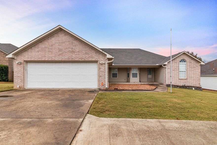 Charming 3-Bedroom, 2-Bathroom Home with ample space and the opportunity to update to your liking. This spacious 1,975 sqft home offers plenty of room for your family to grow. A welcoming covered front porch provides an ideal spot to relax with enough space for furniture. Inside, the open floor plan features a spacious living room with a gas log fireplace and built-in shelves. Don't miss out on that roomy kitchen with plenty of space to cooking your favorite meals. Complete with an island that separates the kitchen from the dining room, making entertaining a breeze. The large master suite offers a private retreat with a generous master bath featuring a jet tub, separate shower, double vanity, and his/her closets for added convenience. Step outside to a fenced backyard that provides ample space for children and pets to play freely. The back deck is perfect for family gatherings or simply enjoying the fresh air. With its spacious rooms and outdoor spaces, this home is ready to welcome you and your family! Being sold AS IS, WHERE IS. New interior paint December 2024