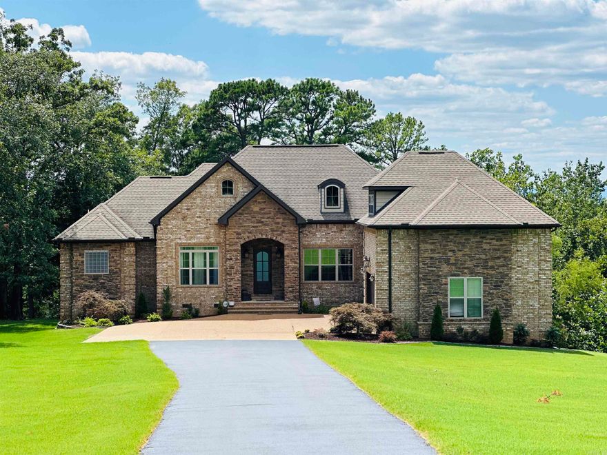 Beautiful home on a manicured lot located in Eagle Mountain Subdivision.  Move-in ready!  Clean, expansive, spacious!  This home has a lot to offer within a top-rated neighborhood near schools, shopping, dining, medical facilities, and much more. There are three levels containing 5 bedrooms, 5 full baths, and an abundant amount of storage.  Designed to meet the needs of any family design.  It contains three levels:  main, basement, & bonus room.  There are two gas log fireplaces and a full dining room.  Basement has a fully functional kitchen.  Home has a large deck on the back with an additional step-down deck recently added & complete w/solar lighting.  Has both pad & crawl-space which is actually a "walk-space" across the front of the home for optimal accessibility, utilization, & storage.  Home has a three car garage along with outdoor parking area for three more.  Asphalt leading up to the pebbled concrete area.  Recent home improvements include:  water softener, premium covered gutters, remote blinds in master bath, new fridge, new dishwasher, new front door, refreshed landscaping, French drain, and the addition of an impressive built-in library.  2 of the 3 air units are new