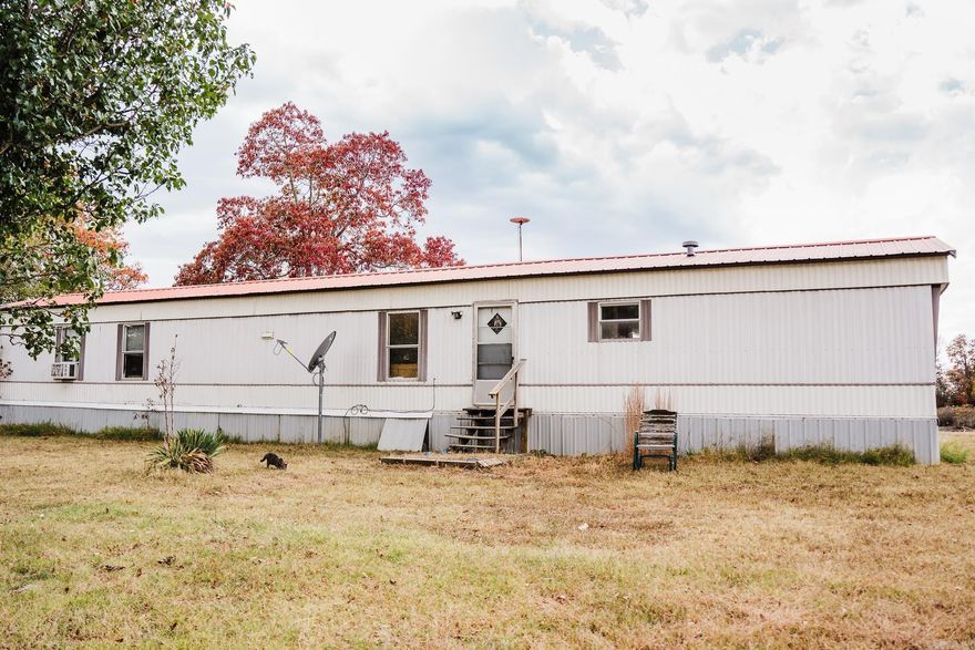 For sale, mobile home only, no land conveys with the sale. Three bedrooms, two baths, 1997 Belmont home offering comfort and affordability. Home is partially furnished and features new laminate flooring and a metal roof. Included appliances (refrigerator, stove, dishwasher, microwave, washer, and dryer). Home is to be relocated at the buyer's expense.