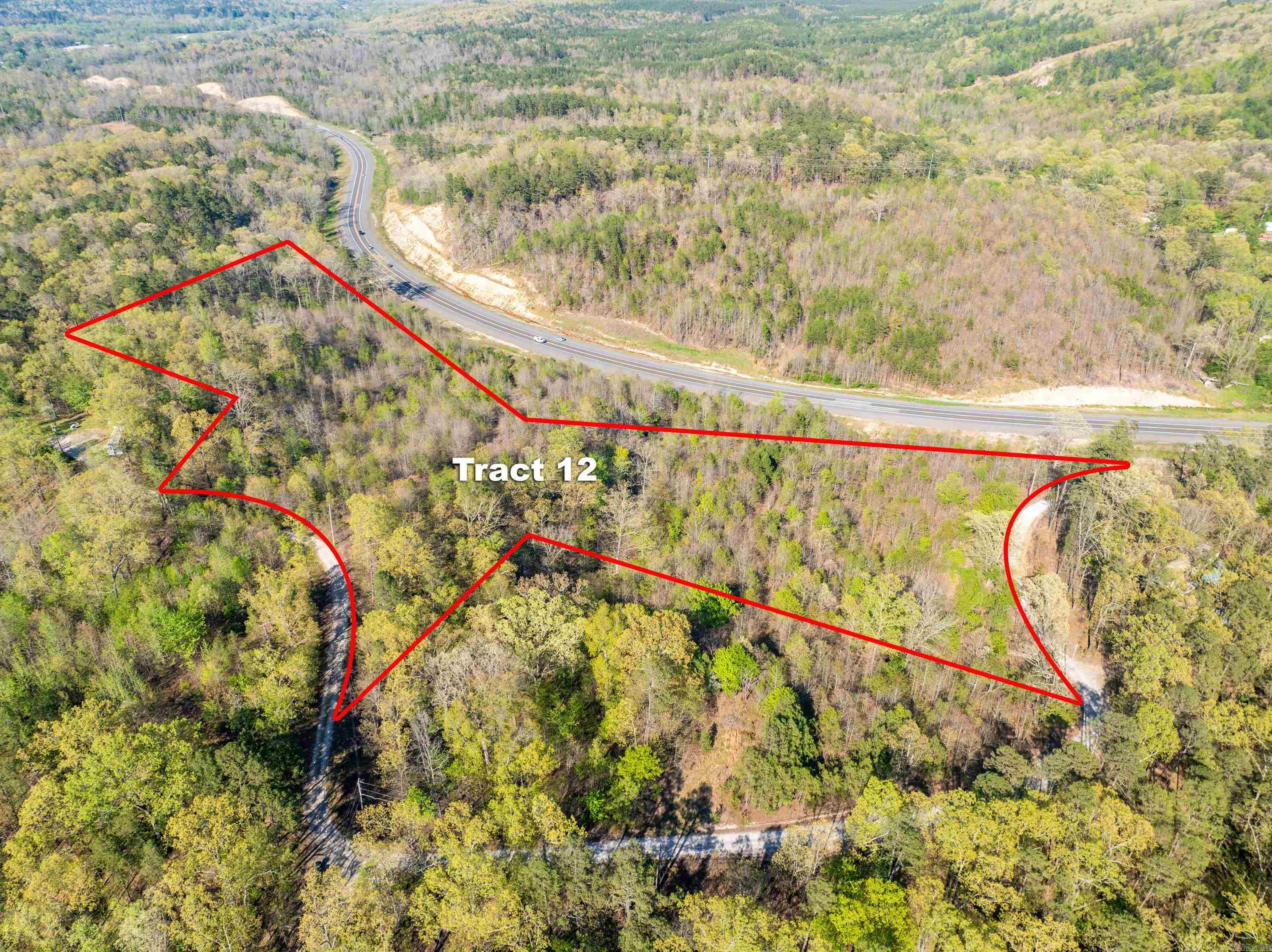 Two parcels totaling 8.01 acres overlooking the new MLK Expy/Hwy 5 Bypass. Great location for hillside AirBNB cabins.