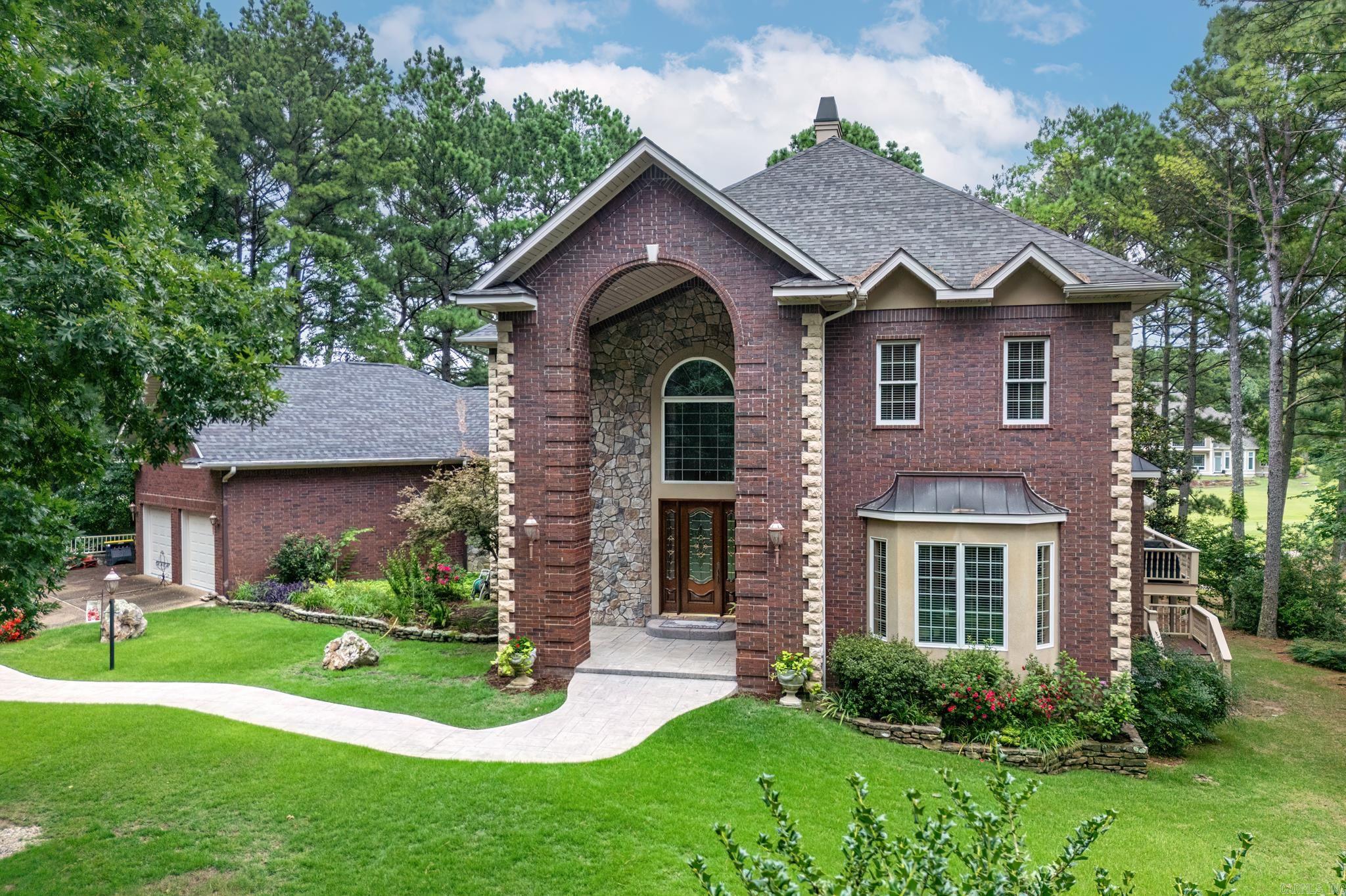 Step into this extraordinary, one-owner gem and prepare to be captivated by its stunning architecture & abundant natural light. You’ll be greeted by soaring ceilings and an open, airy floor plan that invites you to explore every crafted detail. The heart of this home is the gorgeous, chef-inspired kitchen, boasting gleaming granite countertops, exquisite cabinetry, a gas cooktop, and a double drawer dishwasher. Bask in the warmth of the sunroom as you sip your morning coffee, or host unforgettable gatherings on the expansive deck that seamlessly blends indoor and outdoor living. Your private sanctuary awaits in the luxurious en-suite, featuring double doors that open to a deck with breathtaking golf course views. Indulge in the spa-like bathroom w/double vanities and a rejuvenating jetted tub. The upper level is designed with family and guests in mind, offering three additional bedrooms a versatile loft area, and a convenient Jack and Jill bathroom. But the allure doesn’t stop there – venture to the lower level, and you’ll discover a spacious living area complete with a projection screen, ideal for transforming into your very own movie room or state-of-the-art golf simulator.