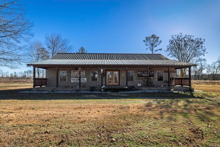 Discover an extraordinary blend of comfort, privacy, and natural beauty at 100 Lake Rd in Donaldson, Arkansas—a rare 138.9-acre riverfront estate featuring nearly 1,200 feet of Ouachita River frontage. The property is anchored by a spacious 4-bedroom, 2.5-bath home with approximately 2,400 sq ft, offering a welcoming layout ideal for family or guests. Surrounded by towering trees, rolling terrain, and scenic open fields, the home provides peaceful views that evolve with every season.  Outside, the land is a true outdoor enthusiast’s dream with roughly 20 acres of uncut pine, additional replanted pine, and an extensive trail system perfect for exploring, hunting, or riding. A stunning 15-acre stocked pond offers fishing, wildlife viewing, and quiet moments of reflection, while the expansive river frontage invites kayaking, paddling, or sunset walks along the water.  Whether you’re seeking a private retreat, a premier hunting property, or a legacy investment, this one-of-a-kind Arkansas property delivers unmatched privacy, abundant wildlife, and breathtaking riverfront living—secluded, yet within reach of modern conveniences.