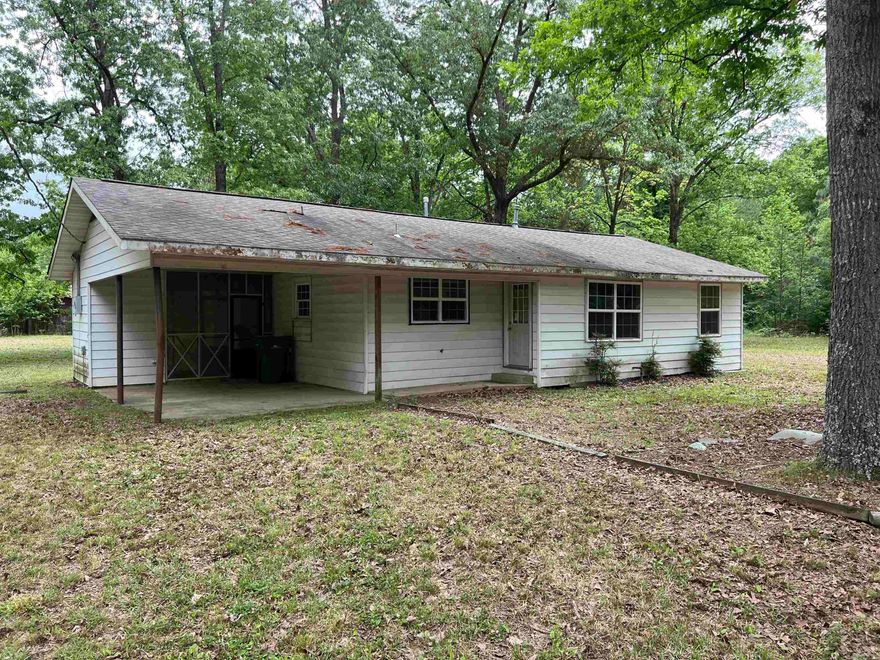 Check out this two bed on bath home on 7.3 acres.  If you're looking for quiet county living but yet close to the amenities that Pine Bluff has to over this is the perfect choice for you.  This home has spacious bedrooms, large laundry room, hardwood floors and plenty of storage. Property being sold as is.