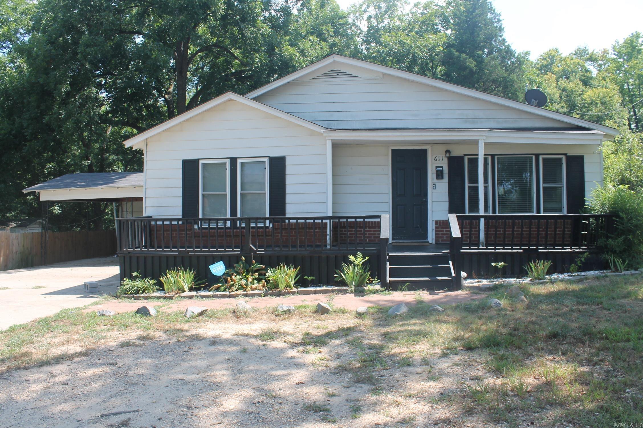 3 bedroom and 2 bath home next to Sheridan High School. Fenced in yard with front porch. Remolded bathrooms, new water lines, newer windows, water heater and appliances. Washer and dryer convey with house. AC serviced a month ago. Give me a call to see this one today. 870-941-0353