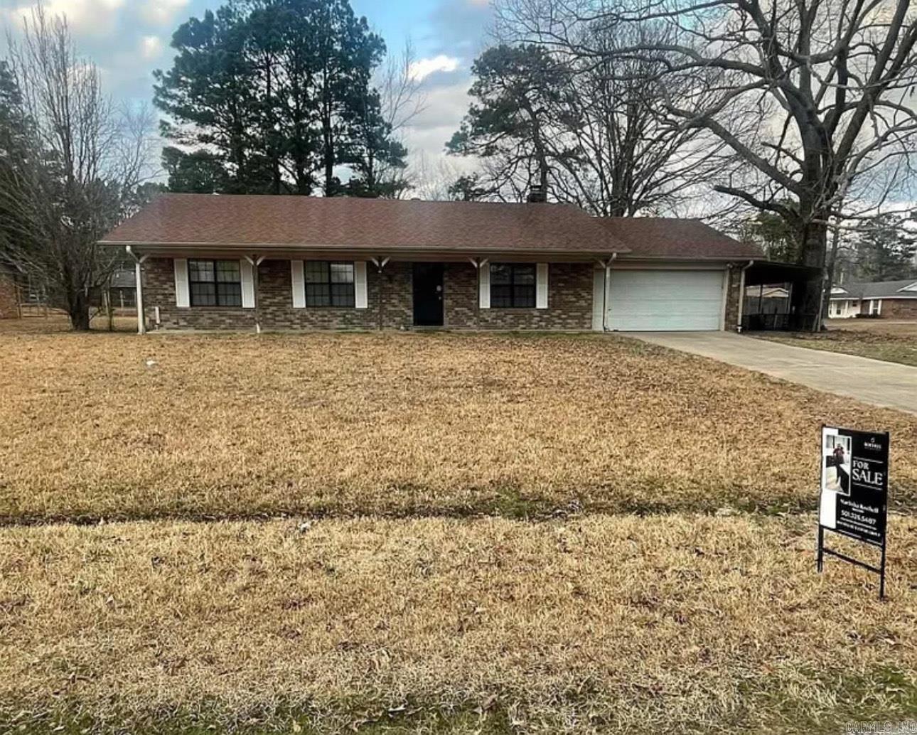 Welcome to this 3-bedroom, 1.5-bath brick home, offering comfort, convenience, and plenty of storage! Nestled on a spacious lot, this home features a 2-car garage and a covered patio, perfect for relaxing or entertaining. Inside, you'll find a warm and inviting living space with ample natural light. The backyard boasts a separate storage building along with an RV/boat cover, making it ideal for those who need extra space for hobbies or outdoor gear. Don’t miss this fantastic opportunity Call to Schedule A Showing Today!