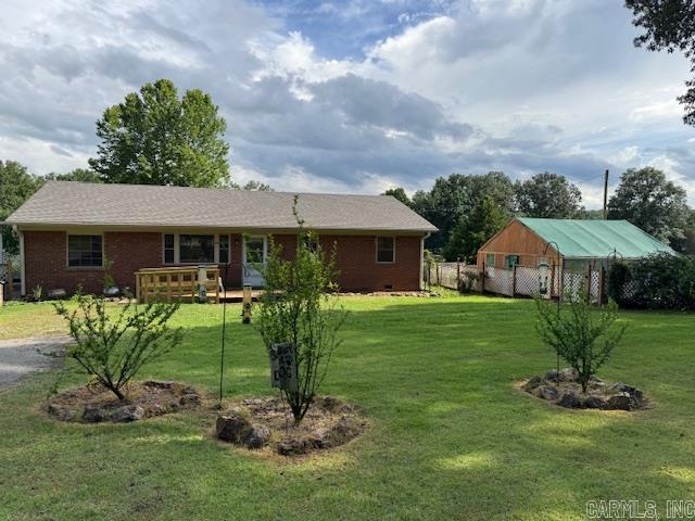 1780 SQ FT BRICK HOME ON 2 ACRES! Located about 5 miles from Pocahontas city limits, this little homestead is perfect! 4 bedroom, 2 bathroom, living room, dining room, kitchen, laundry room with front loader washer included. Master suite with walk in shower, walk in closet and door to private patio! Partial unfinished basement for tornado shelter and storage. Lots of extras with this property such as tray ceilings, gas fireplace, 2008 central heat and air, 2025 roof, termite contract with Hyde’s, survey, reverse osmosis water purification system and wheelchair ramp. 1780 square feet. Home has septic system and LCRW, rented propane tank, Clay County Electric and Clay County Connect Fiber Optic Internet. Surveyed 2 acres has tons of beautiful flowers, trees, plants and a small orchard with pear and apple trees, blackberry and raspberry bushes. There are three outbuildings, one with electric. Large 18x24 greenhouse with heater, gas, electric and water. 54” zero turn Craftsman mower also included!