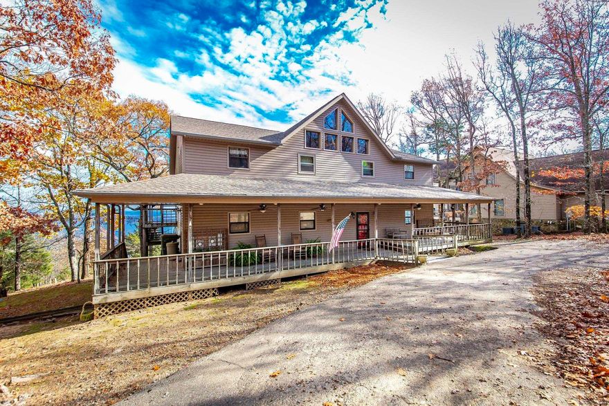 The BEST view on the Lake!  This Diamond Bluff home has had only one owner and is perfect for any large family or lots of friends.  Roof replaced 2020.  It has 2 completely different living spaces. Various updates have been made to both. The approx. square footage is 2000 upstairs and 2000 downstairs. A total of 6 bedrooms, including a master upstairs and downstairs.  4 bathrooms with 2 upstairs and 2 down.  Kitchen, laundry room, and nice living rooms upstairs and downstairs.  It is truly a must see! Agents see showing remarks.