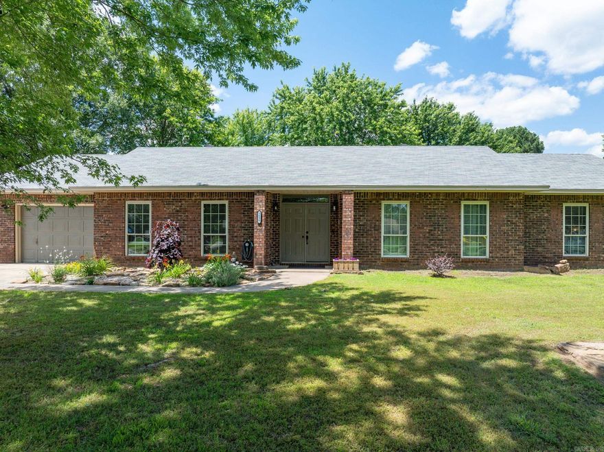 This beautifully remodeled home sits on a spacious 1-acre lot in a quiet, desirable neighborhood. Featuring 4 spacious bedrooms, 2 full bathrooms,  plus a versatile heated and cooled enclosed garage that can easily serve as a 5th bedroom, office, or bonus space- this property offers flexible living to suit any lifestyle.  Enjoy the modern feel of the updated interior with granite countertops, fresh finishes, and thoughtful upgrades throughout. Step outside to a fully fenced backyard that is perfect for kids, pets, or entertaining, and make use of the large  12x22 outbuilding for extra storage or hobby space.  Whether you're looking for room to grow or a peaceful place to unwind, this home has it all. Don’t miss your chance to own a move-in-ready gem with space, style, and convenience!