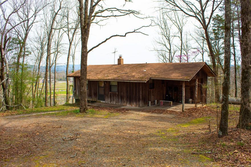 Welcome home to this adorable cabin with a great view! This studio cabin is immaculate and well maintained, one room with a full size kitchen, washer/dryer hookups, full size bathroom, stunning view of the creek below and Clinton high school ball fields!