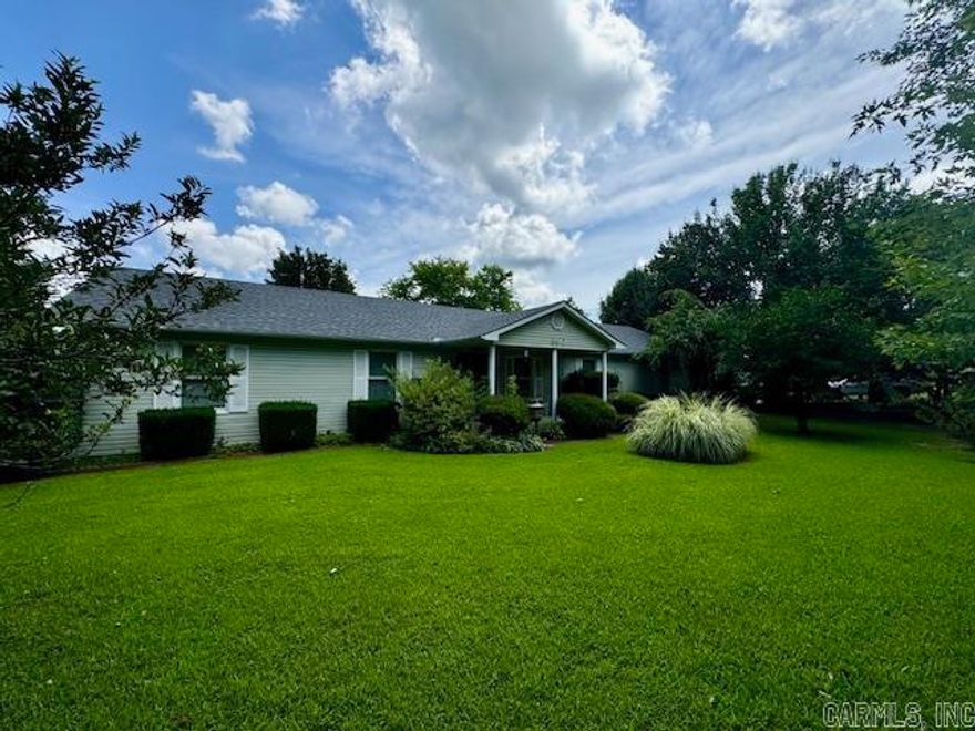 Discover country living just minutes from town with this beautiful 4-bedroom, 2.5-bath home nestled on 3.1 well-manicured acres at the end of a paved dead-end street—only 5 minutes from the Pocahontas city limits. Enjoy privacy, serenity, and the simple pleasures of life in a scenic setting that includes a picturesque pond and plenty of space to roam.  This thoughtfully designed home features an open-concept floor plan ideal for modern living, with spacious rooms that flow seamlessly for entertaining and everyday comfort. The primary suite offers a private retreat with an attached bath, while three additional bedrooms provide space for family or guests. A large addition currently serves as a family room with a gas log fireplace, vaulted ceilings and a sunroom overlooking the backyard, but offers flexible potential to be converted into a 5th bedroom or in-law suite.  Downstairs, you'll find a finished partial walk-out basement beneath the addition, great for storage or a storm shelter. With a private, park-like setting and easy access to town, this unique property offers the best of both worlds—country charm and city convenience. Roof replaced 2022.