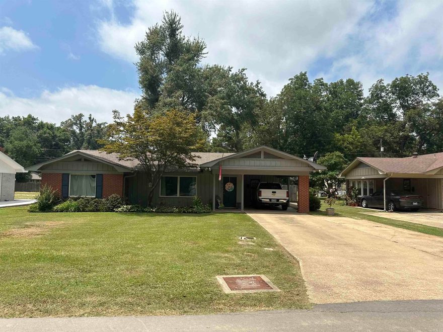 NICE BRICK HOME WITH FRONT PORCH, CARPORT, PRIVACY FENCING AND STORAGE BUILDING. THIS HOME HAS THREE BEDROOMS AND THREE FULL BATHS, LIVING ROOM & DEN, LARGE LAUNDRY, TILE FLOORING AND WILL INCLUDE ALL APPLIANCES. APPRAISAL ON FILE TO SHOW THE VALUE IS AT ASKING PRICE.