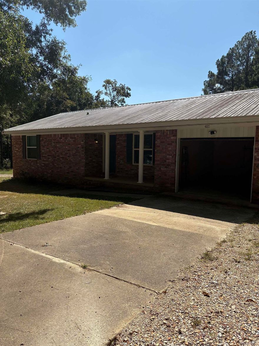 Brick home situated on approx. 9.50 Acres.