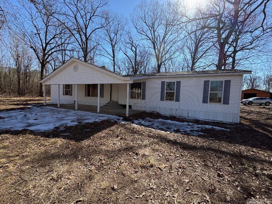 Welcome to Country Living on this Large Acreage Property Just Minutes from Beebe. Double Wide Mobile Home has lots of Potential and is Ready for a Remodel. The Interior has only studs and the Remodel Process has begun the MH has a New Roof in 2025. Nice Fully Enclosed Barn on Property with concrete Floors and a lean to and plenty of room for you horses and other Animals. Property Features 2 Ponds and Electric is at the First Barn and at the Pole Barn also features a new roof. Property has lots of acreage for cattle and horses and all your favorite animals. New Survey has been completed. Give Me a Call Today !! Large Bucks have been on game cameras on this property !! See Agent Remarks  MH is on Permanent Foundation