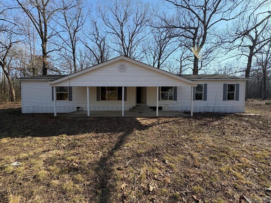 Welcome to Country Living on this Large Acreage Property Just Minutes from Beebe. Double Wide Mobile Home has lots of Potential and is Ready for a Remodel. The Interior has only studs and the Remodel Process has begun the MH has a New Roof in 2025. Nice Fully Enclosed Barn on Property with concrete Floors and a lean to and plenty of room for you horses and other Animals. Property Features 2 Ponds and Electric is at the First Barn and at the Pole Barn also features a new roof. Property has lots of acreage for cattle and horses and all your favorite animals. New Survey has been completed. Give Me a Call Today !! Large Bucks have been on game cameras on this property !! See Agent Remarks  MH is on Permanent Foundation
