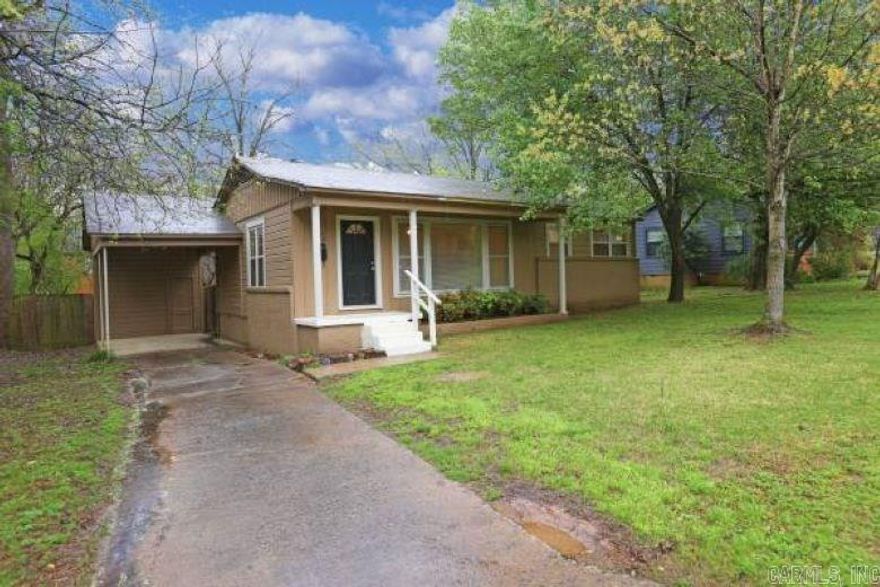 Charming cottage in wonderful neighborhood. The home has fresh paint and new windows have been added. Hardwood flooring in living and bedrooms.Large fenced backyard.