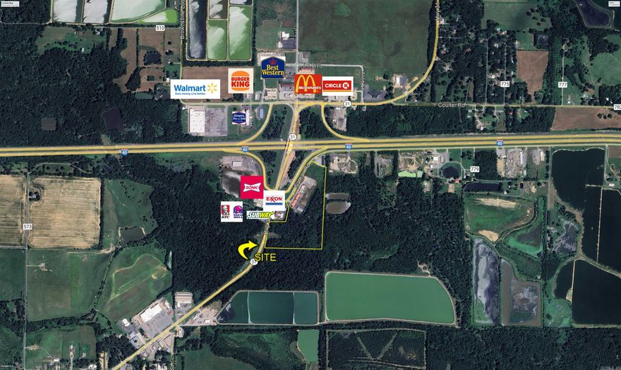 High Visibility Location with Traffic Counts of 39,000-42,000 VPD.  This +/- 25 Acre Lot is Zoned C-2 and is Conveniently Location off Exit 175 on I-40.  Sales Price is Based on +/- 11 Usable Acres.  Previous uses and Structures include a Motel and Restaurant.  This Property is Also Available for Lease on Negotiable Terms. Part of this property is in the Flood Plain and Floodway.